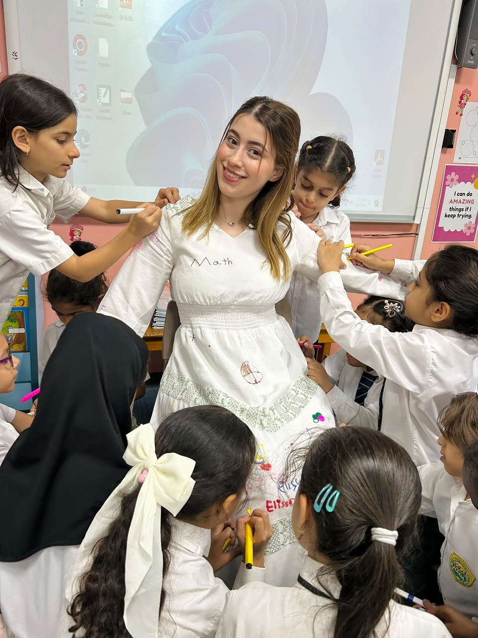 Ms. Elissar guiding a drawing lesson