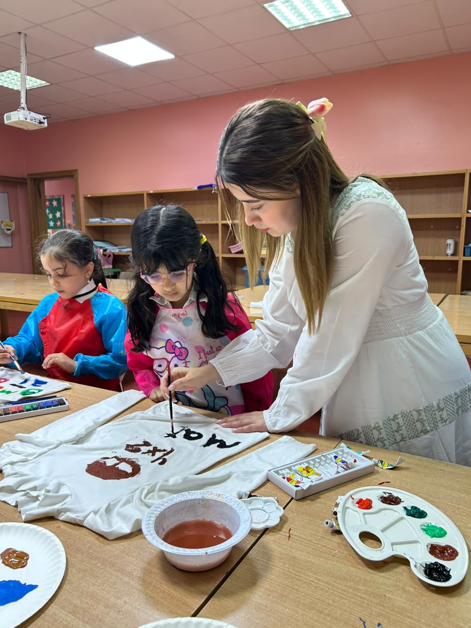 Children practicing drawing and handwriting